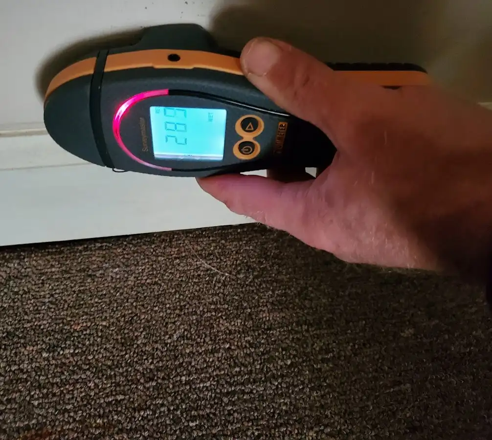 Moisture detection at baseboard during Burst Pipe Cleanup in Desert Hot Springs